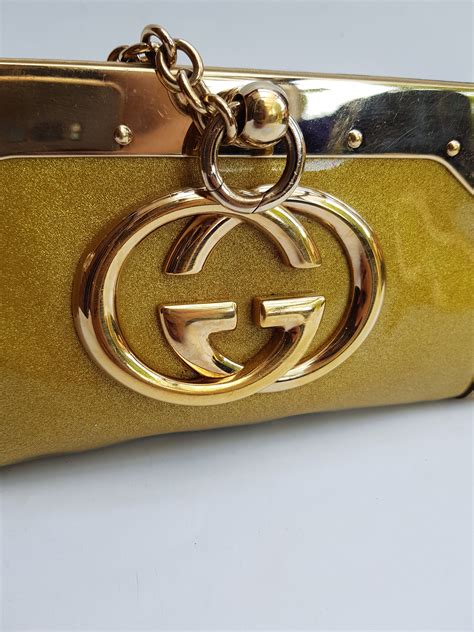 vintage gucci gold clutch|authentic vintage Gucci handbags.